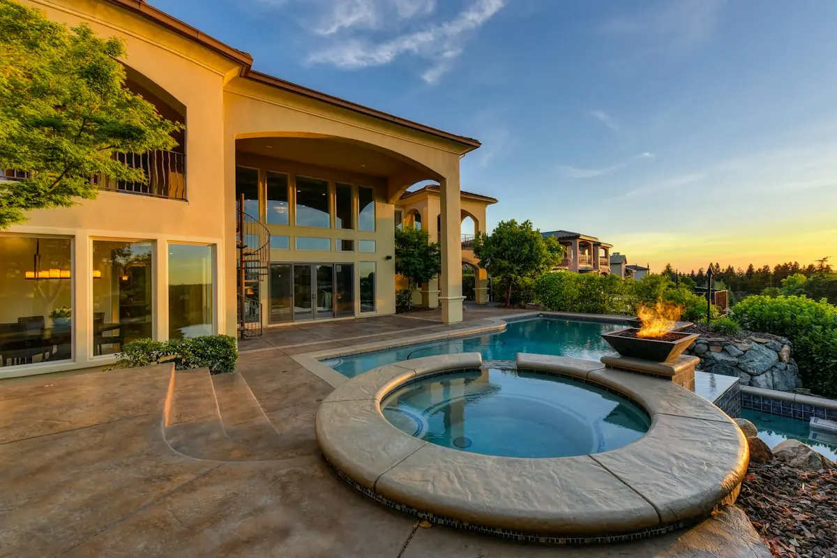 Hill Country residence with pool at sunset